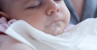 How to Handle a Baby Spitting Milk