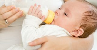 Why is a 3 month old Baby Throwing Up Milk