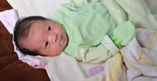 Why 9 month old Babies Spits Up Milk
